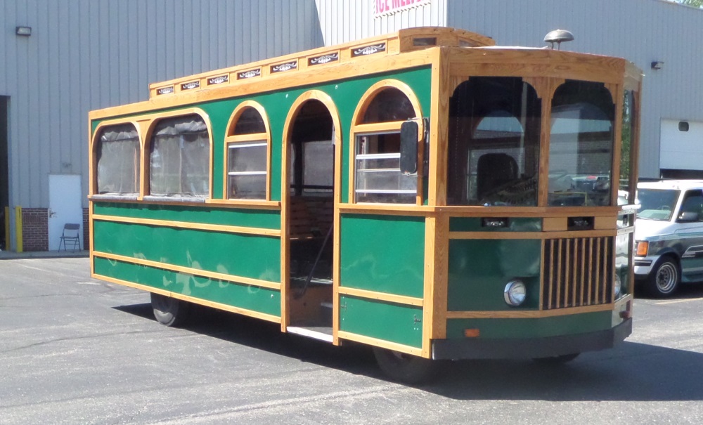 Trolley restoration, with steam bent wood trim and curved window moulding.